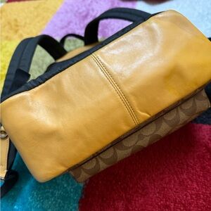 Mini coach backpack about a year old…like new new!